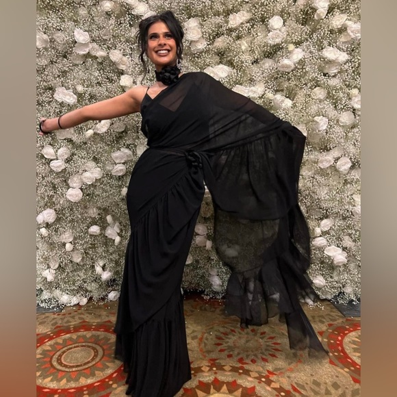 A pre tied black saree with ruffles. The length is un altered. - Picture 2 of 2